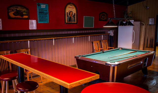 Pool table and red tables in the games corner