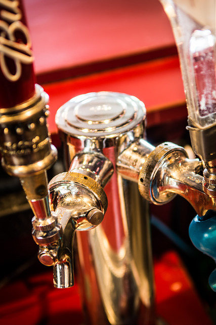 Polished brass beer taps on the bar